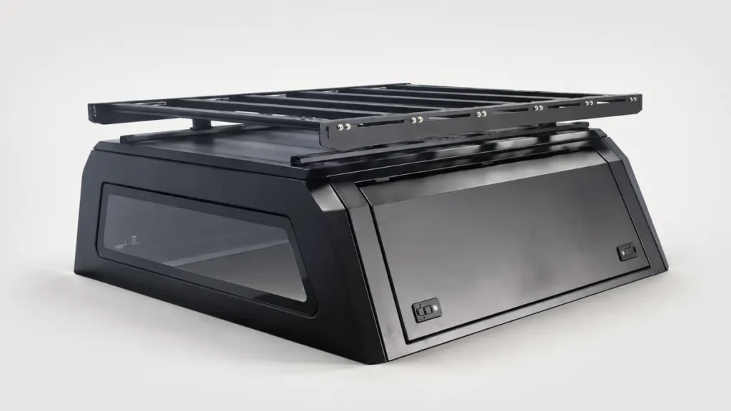 Heavy-duty aluminum luggage rack mounted on a pickup canopy
