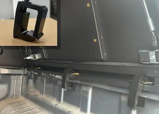 Technician fitting truck canopy hardware