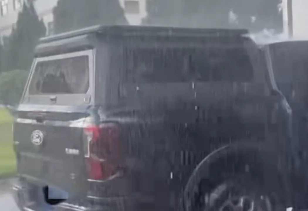 Truck canopy undergoing water exposure evaluation